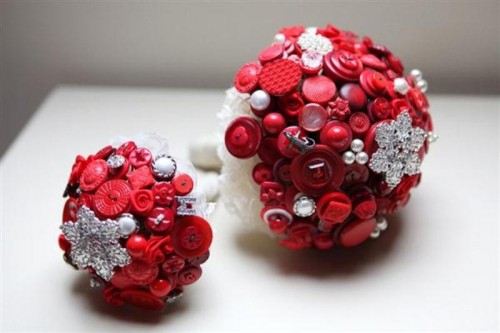 ball wedding bouquets made of red and silver buttons look very bold and very unusual