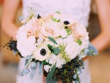 a neutral wedding bouquet of white and blush blooms, berries plus foliage is always a good idea