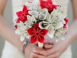 a neutral and red paper bloom wedding bouquet is a durable and stylish idea for a non-typical bride