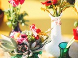 bright florals and succulents in vases will make yoru summer boho wedding cheerful