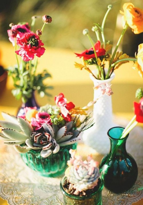 bright florals and succulents in vases will make yoru summer boho wedding cheerful