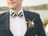 a black suit, a white shirt, a striped bow tie and a neutral floral boutonniere for a super elegant outfit