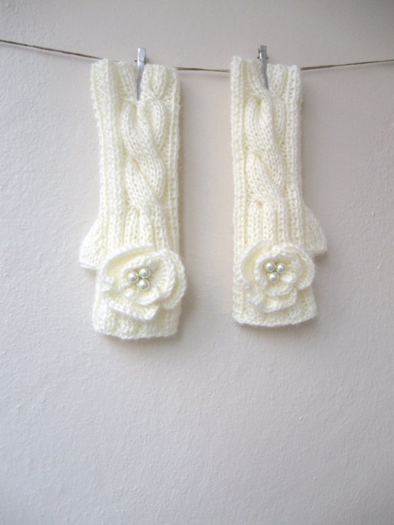 White cable knit mittens with fabric blooms are great for wearing at a Christmas or winter wedding