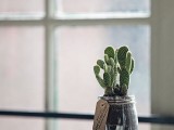 a stylish potted cactus is a nice wedding favor idea that always works, it’s eco and budget-friendly