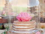naked cakes topped with fresh blooms can be saved from bugs in cloches that will match a garden bridal shower