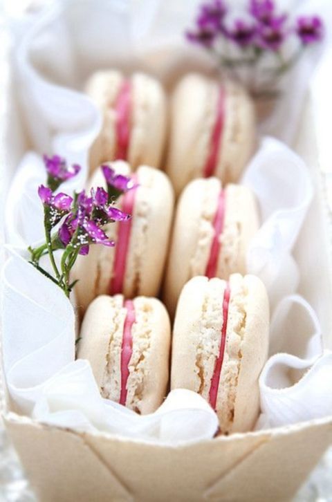a box with macarons and blooms is a delicious and cool bridal shower favor for each gal