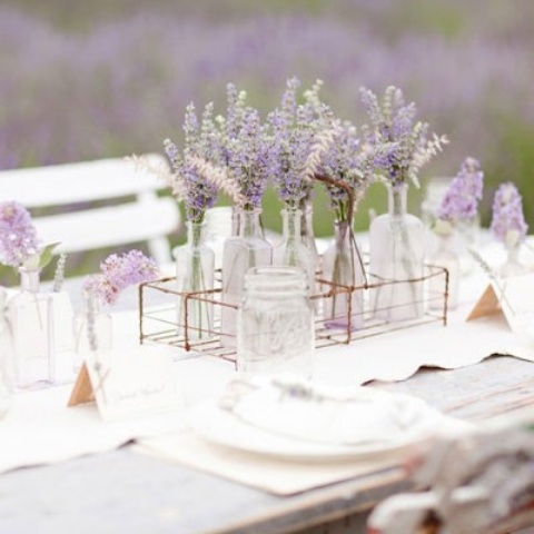lavender in jars and bottles are right what you need for spring bridal shower centerpieces
