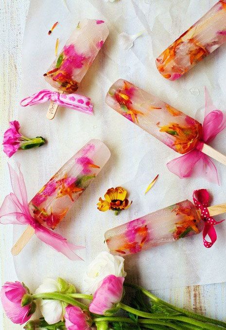 floral popsicles with bows are a nice and refreshing sweet idea for a spring bridal shower