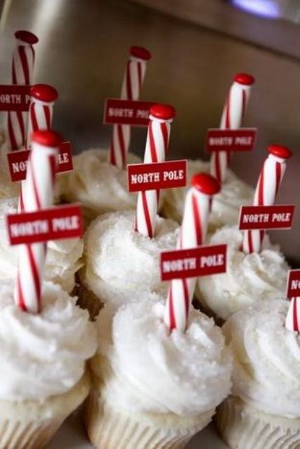 top cupcakes with candy canes and candies to make them look more Christmassy and winter-like