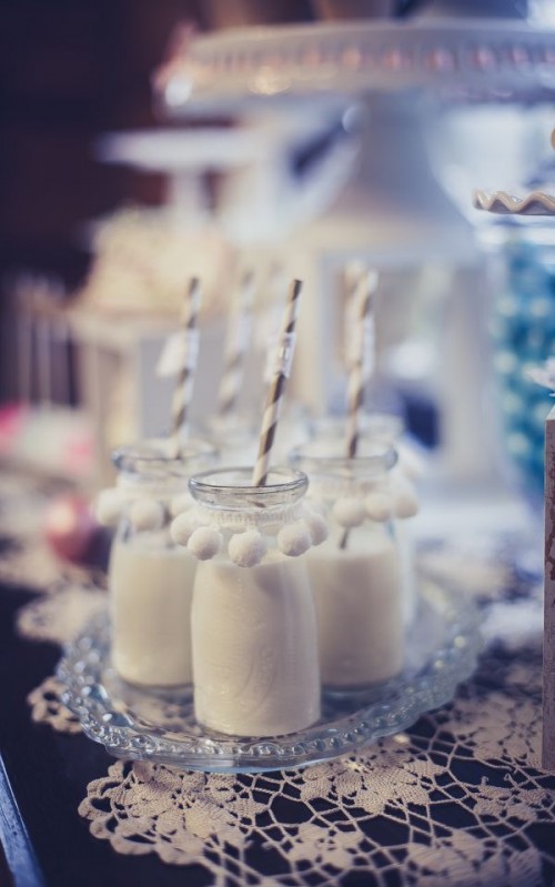 dress up jars or mugs with drinks with white pompoms to make them look wintry-like and cozy
