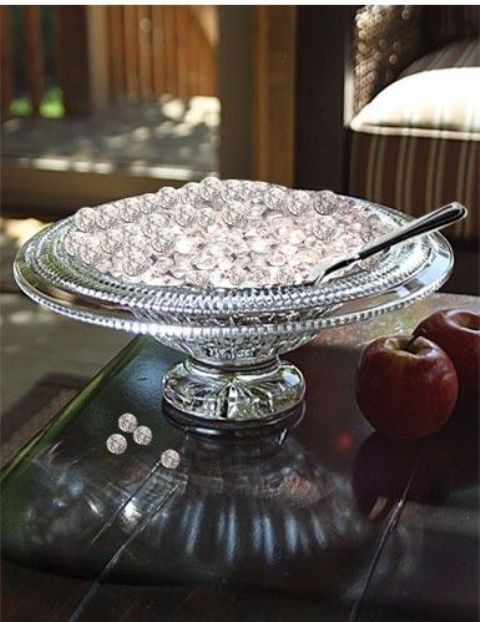 a creative winter bridal shower centerpiece of a glass bowl with glass beads is very easy to recreate