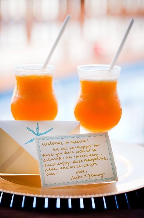 fresh orange juice is a perfect signature drink for an orange beach wedding, it fits the color scheme and refreshes very well