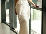 a Grecian-style one shoulder wedding dress with drapering as the main detail is a catchy idea to feel a Greek goddess