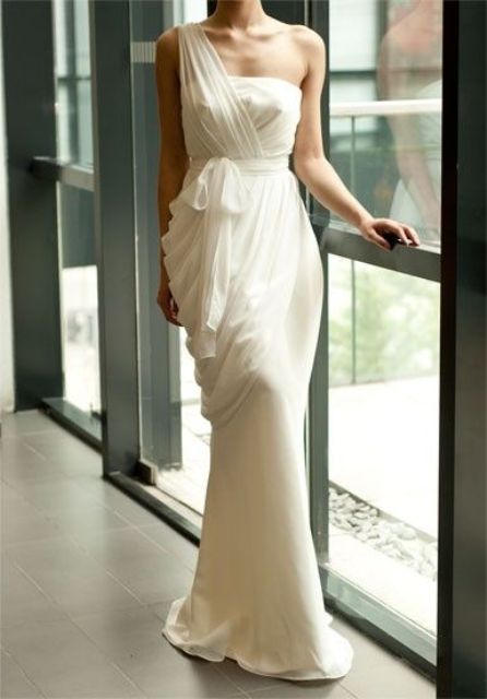 a Grecian-style one shoulder wedding dress with drapering as the main detail is a catchy idea to feel a Greek goddess