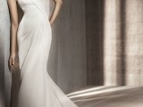 an elegant and refined pleated fitting one shoulder wedding dress with pleating and a train is a gorgeous idea