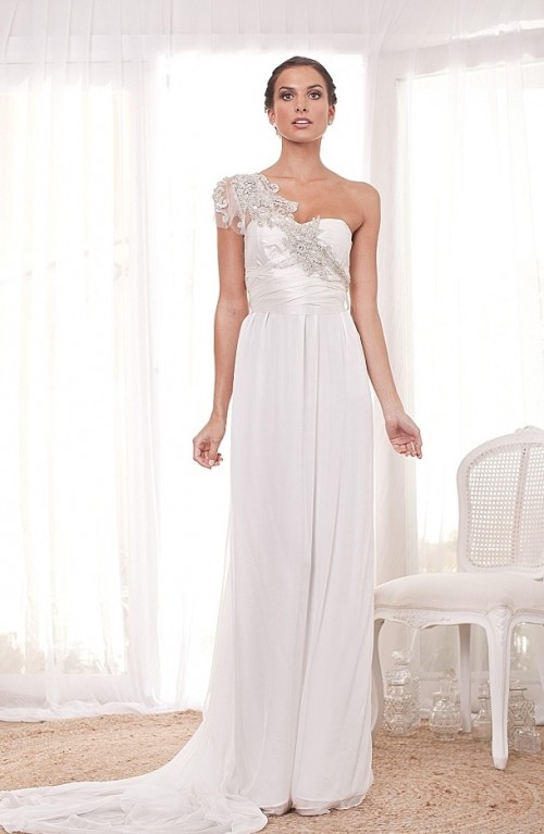 a refined one shoulder wedding dress with a draped bodice, a pleated skirt, a silver lace detail on the shoulder is a lovely idea for a vintage bride