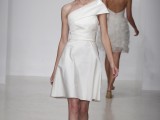 a modern take on a 50s wedding dress – a plain A-line knee dress with a shoulder detail and a draped bodice
