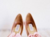 pink peep toe shoes with fabric blooms on top are a nice romantic touch to the look