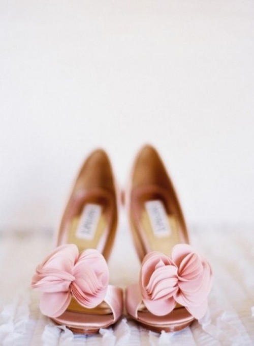 pink peep toe shoes with fabric blooms on top are a nice romantic touch to the look
