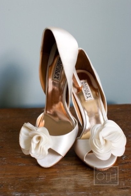 white peep toe shoes with large fabric blooms will add classic chic to your bridal style