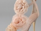 strappy blush shoes with large blush fabric blooms will give you an ethereal and chic look with a feminine feel
