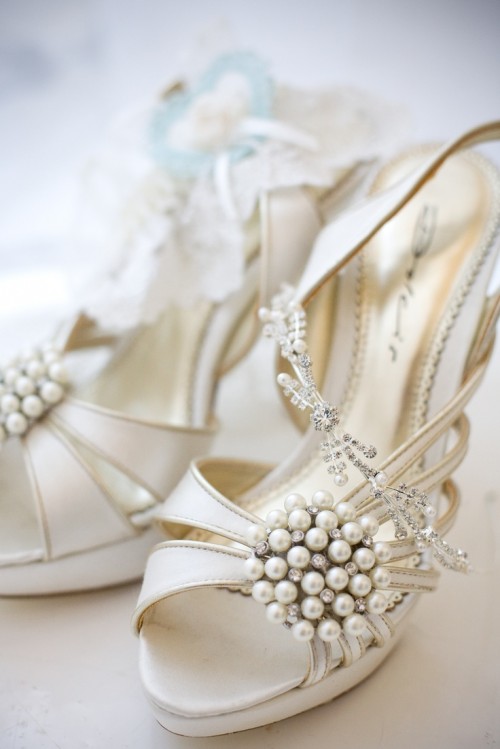 white strappy laser cut shoes with statement embellishments are a nice option for a vintage summer bridal look