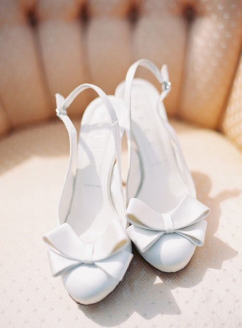 elegant white slingbacks with bows are a nice idea for a retro bridal look or to add classic elegance