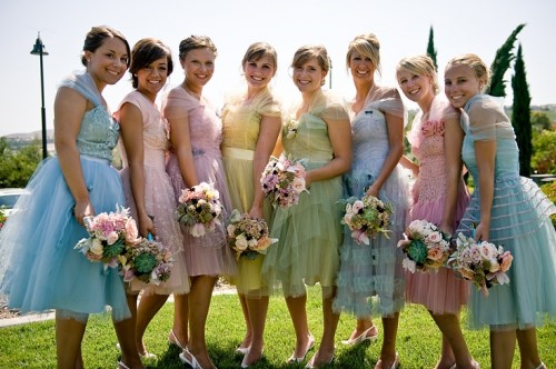 pastel A-line midi bridesmaid dresses, slingbacks and pearls are adorable for a pastel vintage or retro wedding