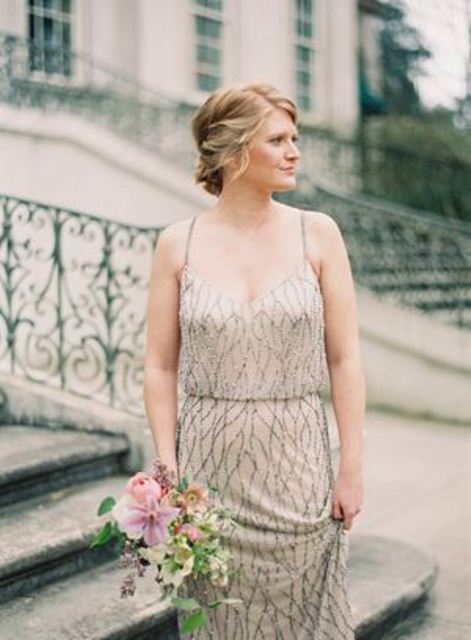 an exquisite neutral bridesmaid dress, fully embellished and with embellished straps is a gorgeous idea for a refined vintage wedding