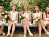 a white lace mini bridesmaid dresses of A-line silhouettes are a chic and lovely idea for a vintage wedding, add pearls and voila