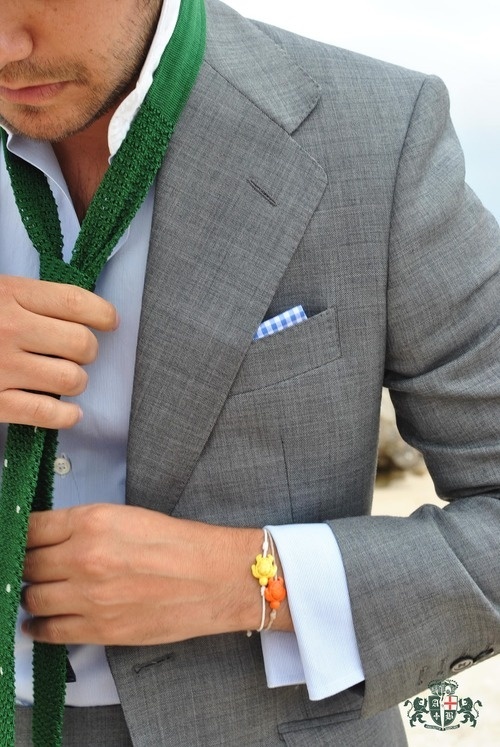 a light grey suit, a white shirt and a bright green tie look very refreshing and vivacious