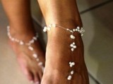 pearl barefoot wedding sandals look ethereal and veyr delicate, they will add a slight glam touch to your look