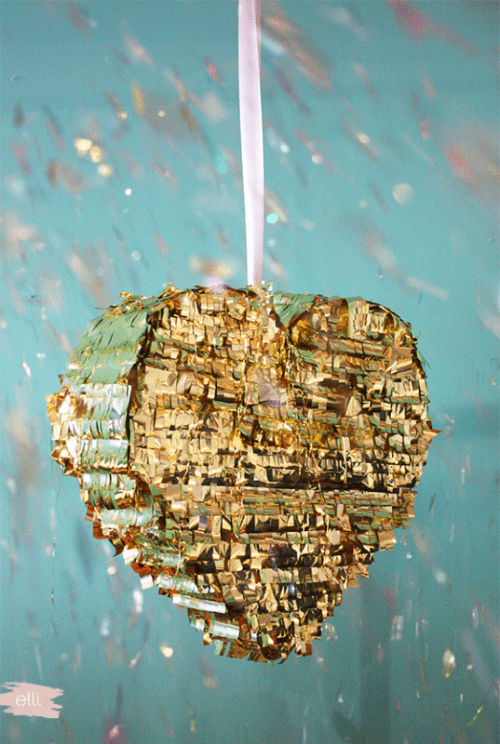 Cool DIY Shiny Gold Fringe Piñata To Make For Any Wedding Party