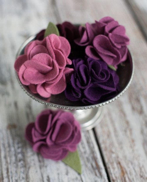 bright and dark felt flowers can be used for making garlands, centerpieces, added to bouquets and in many other ways, too