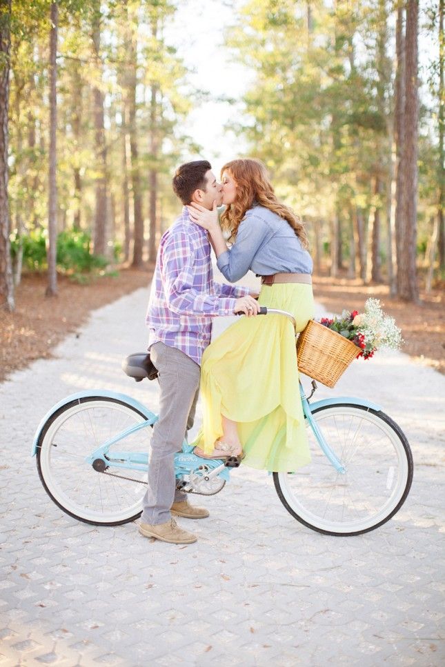 Incorporate your favorite activities, for example, riding a bike, into your engagement photo shoot