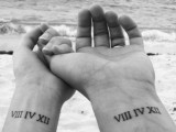 wedding date tattoos made with Roman numbers on the wrists is a cool idea to accent your body