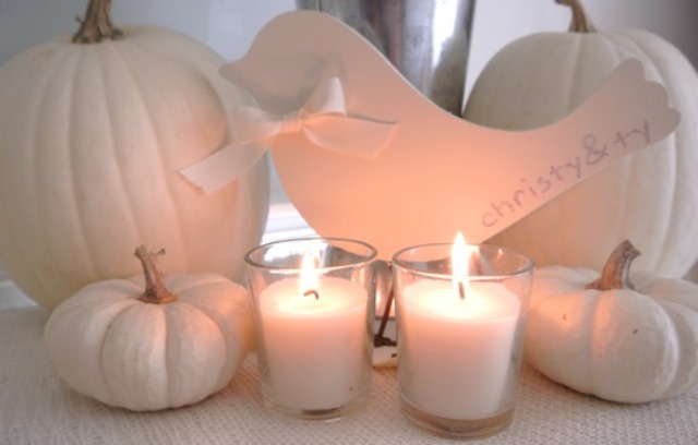 White pumpkins and candles are a chic and stylish decor idea for a neutral fall bridal shower