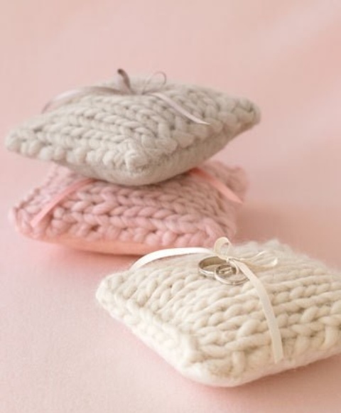 pastel and neutral knit ring pillows are great for a fall or winter wedding, and you can DIY them