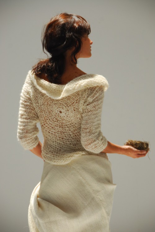 a neutral knit cardigan with short sleeves is a lovely idea for a winter wedding, whether it's part of your outfit or just a cover up