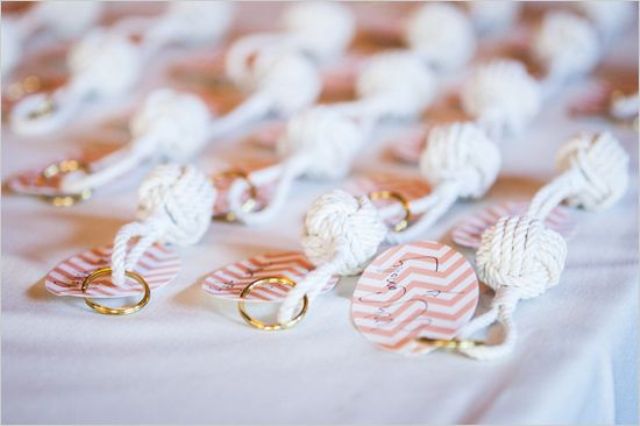 large rope knots with chevron escort cards is a cool wedding seating chart for a beach or coastal wedding