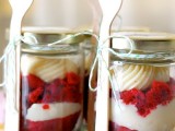 homemade red velvet pie in jar with wooden spoons is a cute homey and eco-friendly favor for a summer or some other wedding