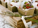 boxes with fresh strawberries are a super cute wedding favor idea for a summer wedding with any wedding theme or style