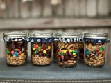 jars with cookies, M&Ms, nuts and other stuff are delicious and very simple to DIY wedding favors