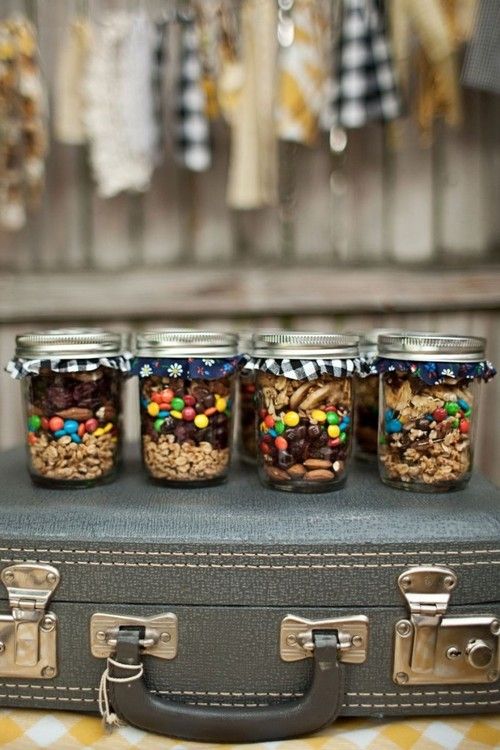 jars with cookies, M&Ms, nuts and other stuff are delicious and very simple to DIY wedding favors