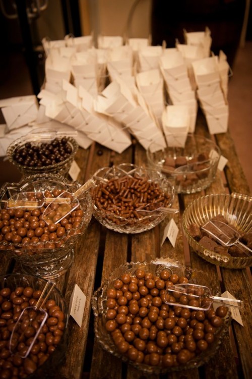 lots of various delicious chocolate candies and boxes to pack them - let your guests choose what they love