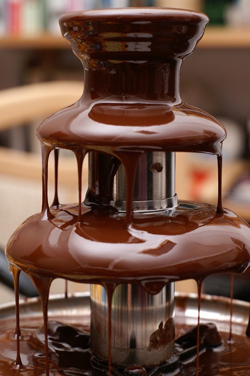 a chocolate fountain is a fantastic idea to please your guests and entertain them a little bit