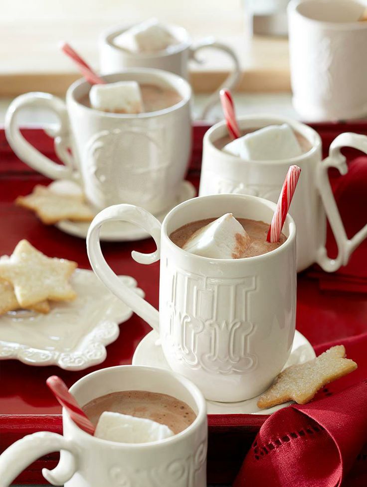 Hot chocolate topped with marshmallows and candy canes is a lovely idea of a wedding dessert or just a hot drink to warm everyone up