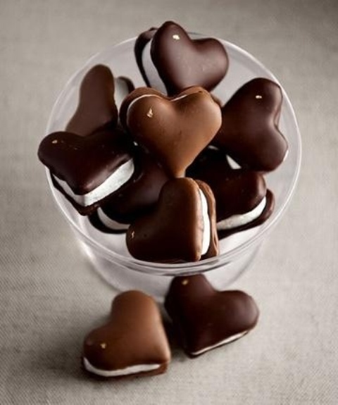 chocolate heart-shaped sandwiches with whipped cream are amazing wedding desserts or favors