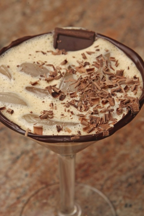 a milky cocktail topped with chocolate is a lovely idea of a wedding dessert or drink to enjoy