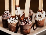 hot chocolate popsicles on sticks, with marshmallows and peppermint bark are lovely Christmas or winter wedding desserts to enjoy